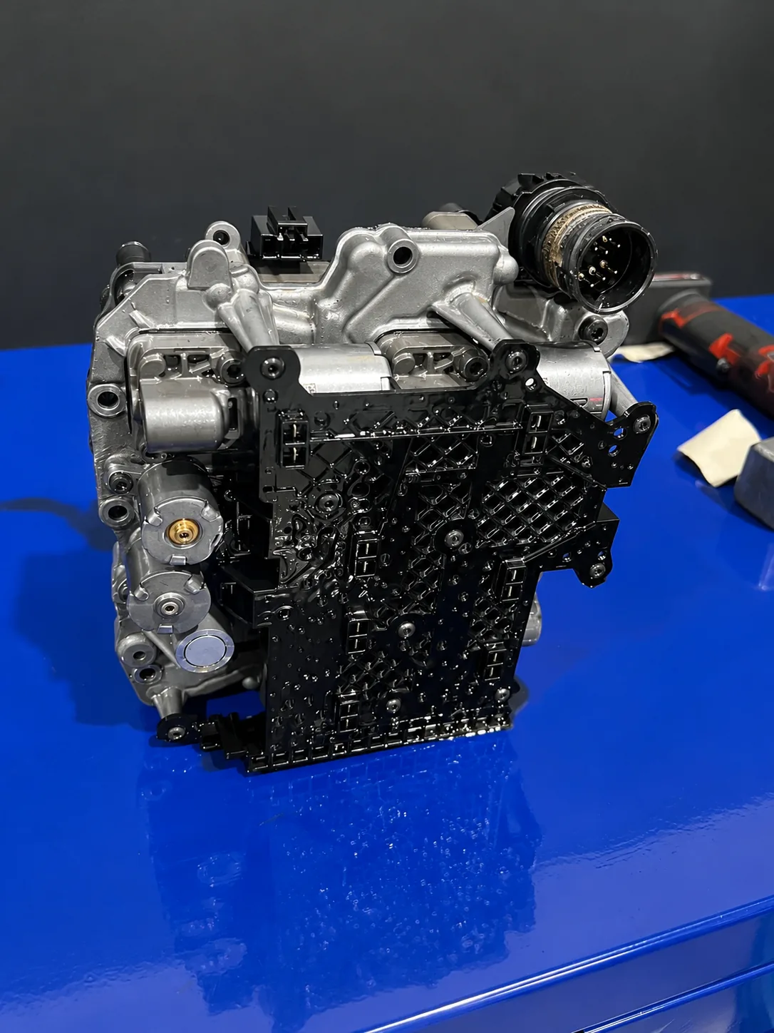 DSG mechatronic unit on the workshop bench